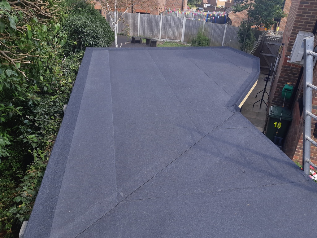 A newly felted black mineral felt roof.